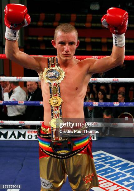 Paul Butler celebrates after winning the Commonwealth Super-Flyweight championship fight at Liverpool Olympia on June 28, 2013 in Liverpool, England