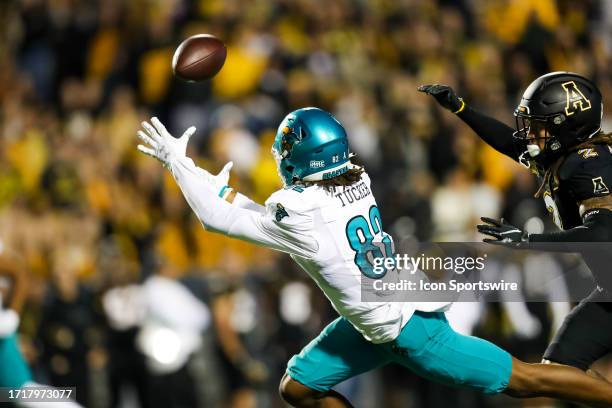 Jameson Tucker of the Coastal Carolina Chanticleers catches the ball during a football game against the Appalachian State Mountaineers at Kidd Brewer...