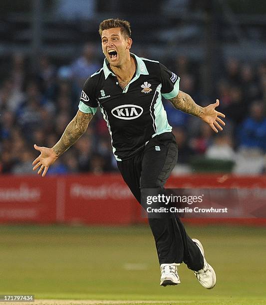 Jade Dernbach of Surrey celebrates the wicket of Dwayne Smith of Sussex during the Friends Life T20 match between Sussex Sharks and Surrey Lions at...