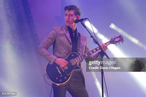 Alex Turner of The Arctic Monkeys performs at day 2 of the 2013 Glastonbury Festival at Worthy Farm on June 28, 2013 in Glastonbury, England.