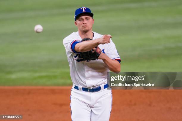 Texas Rangers shortstop Corey Seager throws across the field during game 3 of the ALDS between the Baltimore Orioles and the Texas Rangers on October...