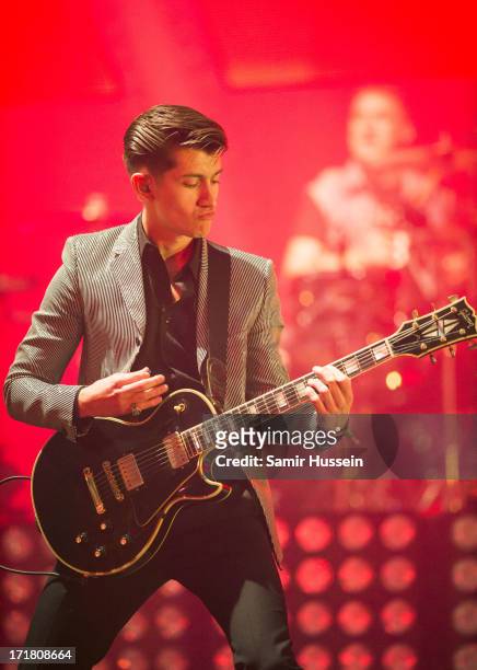 Alex Turner of The Arctic Monkeys performs on the Pyramid Stage at the Glastonbury Festival of Contemporary Performing Arts at Worthy Farm, Pilton on...