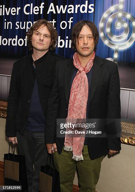 Simon Jones and Nick McCabe of The Verve attending the Nordoff Robbins Silver Clef Awards at London Hilton on June 28, 2013 in London, England.