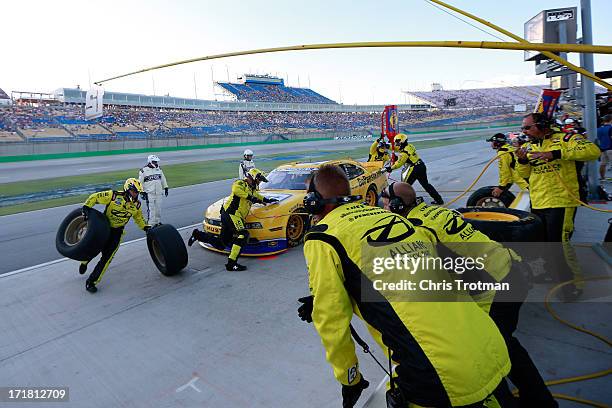 Sam Hornish Jr., driver of the Penske Truck Rental Ford, pits during the NASCAR Nationwide Series Feed The Children 300 at Kentucky Speedway on June...