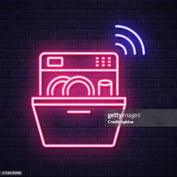 smart dishwasher. glowing neon icon on brick wall background - kitchen wall stock illustrations