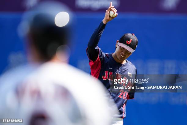 Shuichiro Kayo of Team Japan reacts after striking out in the 4th inning during the baseball Super Round game Japan and South Korea on day ten of the...