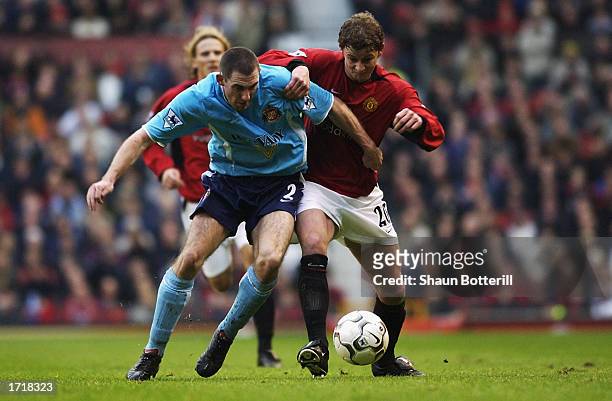 Stephen Wright of Sunderland challenges Ole Gunnar Solskjaer of Manchester United for possession of the ball during the FA Barclaycard Premiership...