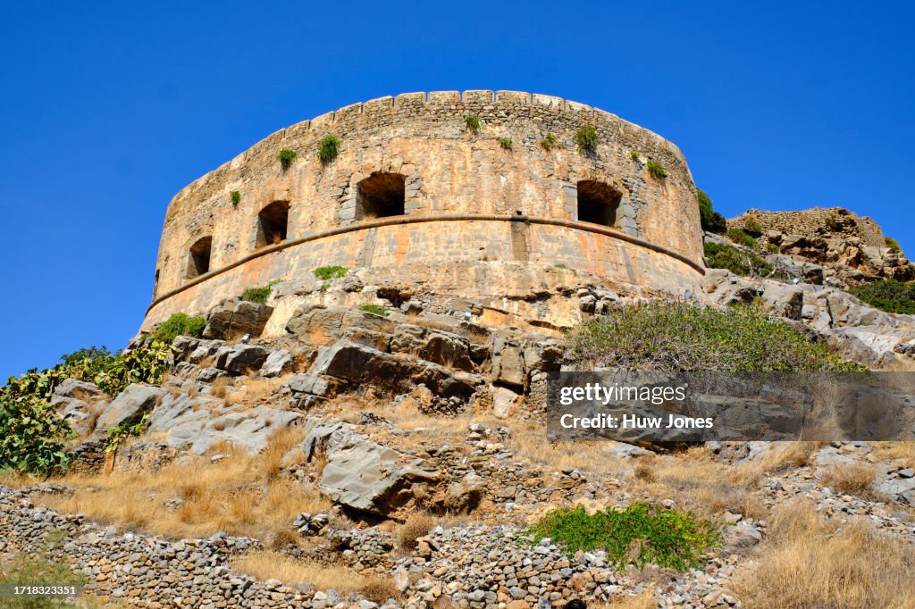 Exterior wall of Spinalonga Fortress shot from below
