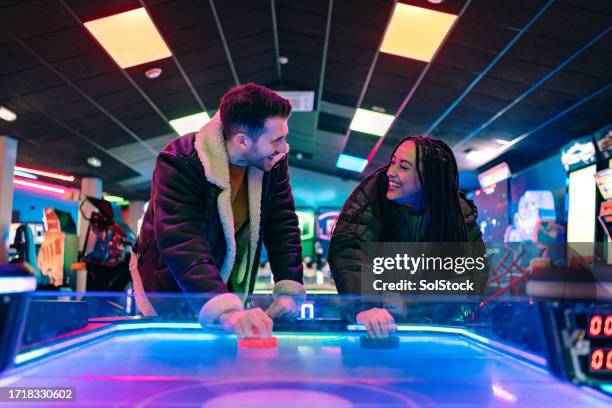 weekends are the best - arcade stock pictures, royalty-free photos & images