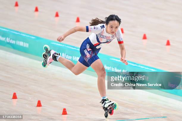 Ting Yu-En of Team Chinese Taipei competes in the Roller Skating - Women's Inline Freestyle Skating Speed Slalom Final on day 12 of the 19th Asian...