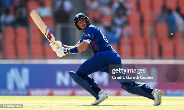 Joe Root of England plays a shot during the ICC Men's Cricket World Cup India 2023 between England and New Zealand at Narendra Modi Stadium on...