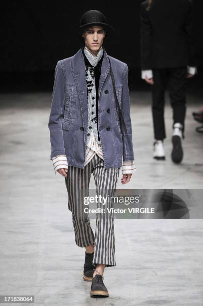 Model walks the runway during the Ann Demeulemeester Menswear Spring/Summer 2014 Show as part of the Paris Fashion Week on June 28, 2013 in Paris,...