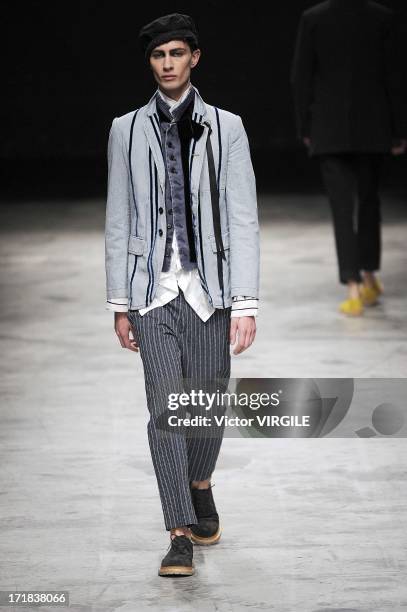 Model walks the runway during the Ann Demeulemeester Menswear Spring/Summer 2014 Show as part of the Paris Fashion Week on June 28, 2013 in Paris,...