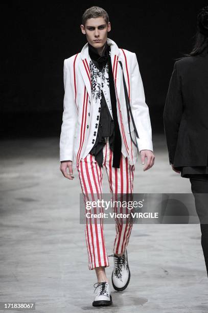 Model walks the runway during the Ann Demeulemeester Menswear Spring/Summer 2014 Show as part of the Paris Fashion Week on June 28, 2013 in Paris,...