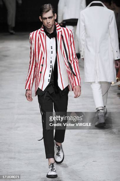 Model walks the runway during the Ann Demeulemeester Menswear Spring/Summer 2014 Show as part of the Paris Fashion Week on June 28, 2013 in Paris,...