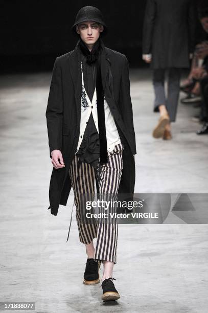 Model walks the runway during the Ann Demeulemeester Menswear Spring/Summer 2014 Show as part of the Paris Fashion Week on June 28, 2013 in Paris,...