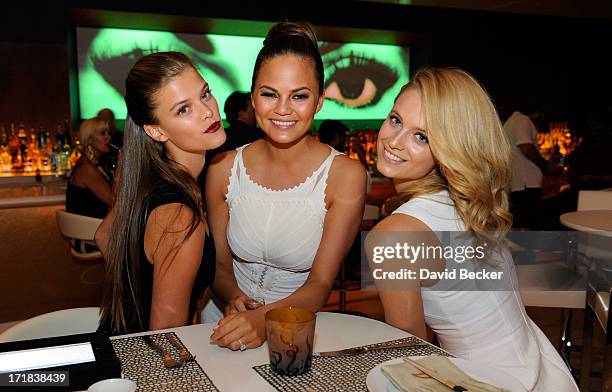 Sports Illustrated swimsuit models Nina Agdal, Chrissy Teigen and Kate Bock appear at Andrea's at Encore Las Vegas on June 28, 2013 in Las Vegas,...