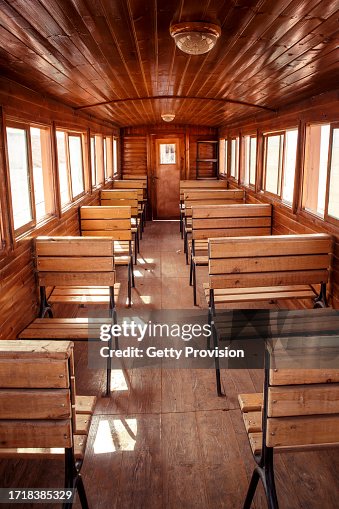 Antique steam locomotive with wagons in the desert of Wadi Rum in Jordan - inside view of the wagons.