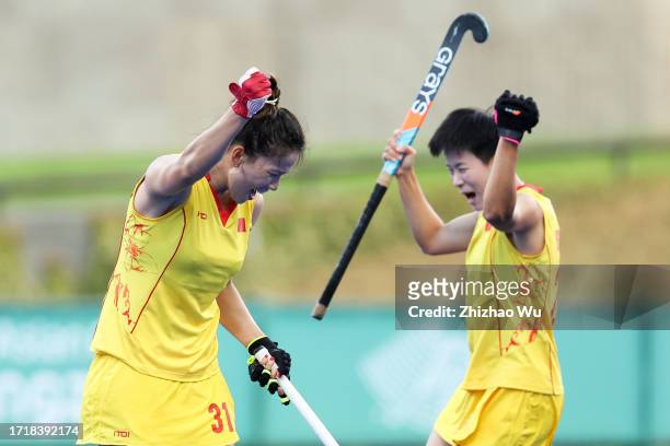 Zhong Jiaqi of China celebrates her goal during The 19th Asian Games, Hockey Women's semifinal between India and China at Gongshu Canal Sports Park...