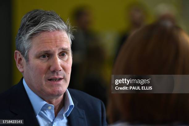 Britain's main opposition Labour Party leader Keir Starmer speaks during an interview with Sky News, on the final day of the annual Labour Party...