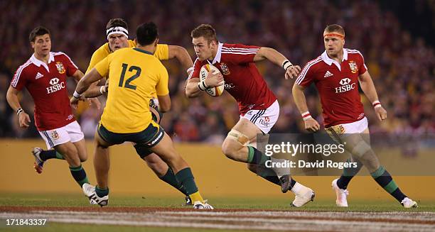 Dan Lydiate of the Lions takes on Christian Leali'fano during game two of the International Test Series between the Australian Wallabies and the...
