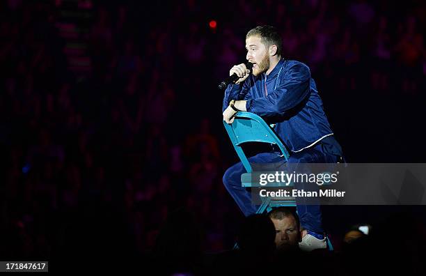 Recording artist Mike Posner performs as he opens for Justin Bieber at the MGM Grand Garden Arena on June 28, 2013 in Las Vegas, Nevada.