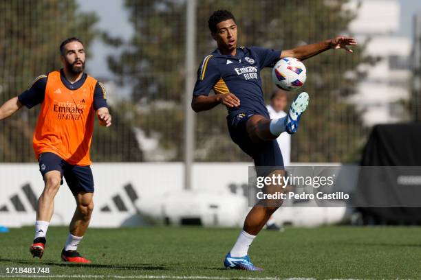 Daniel Carvajal and Jude Bellingham players of Real Madrid are training at Valdebebas training ground on October 05, 2023 in Madrid, Spain.