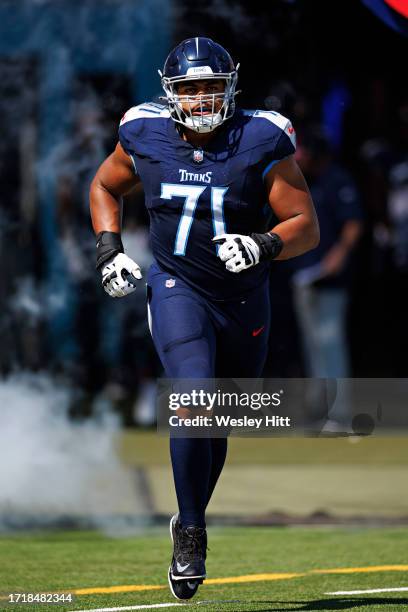 Andre Dillard of the Tennessee Titans during introductions before the game against the Cincinnati Bengals at Nissan Stadium on October 1, 2023 in...