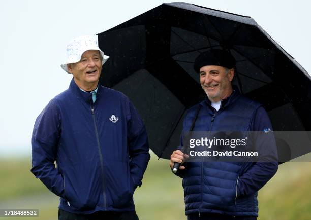 Bill Murray and Andy Garcia of The United States the Hollywood actors wait to putt on the third green during the first round of the Alfred Dunhill...