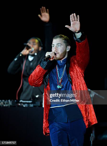 Recording artist Mike Posner and DJ Dubz perform as they open for Justin Bieber at the MGM Grand Garden Arena on June 28, 2013 in Las Vegas, Nevada.