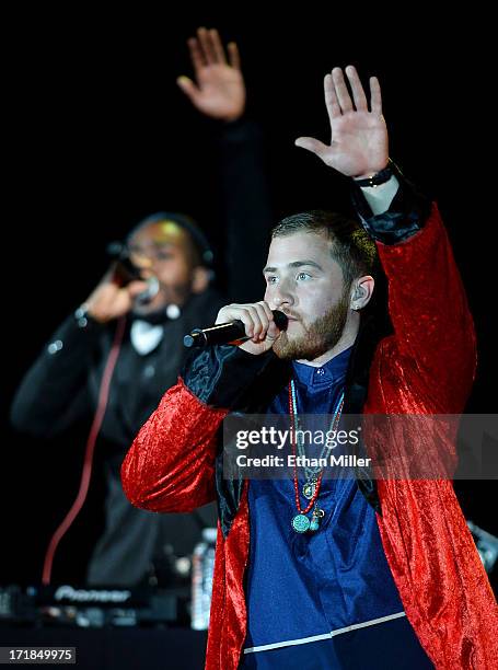 Recording artist Mike Posner and DJ Dubz perform as they open for Justin Bieber at the MGM Grand Garden Arena on June 28, 2013 in Las Vegas, Nevada.