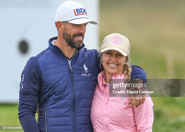 Billy Horschel of The United States enjoying a moment with his wife Brittany Horschel his playing partner on the third hole during the first round of...