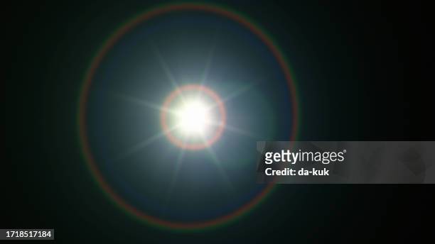 natural lens flare overlay on black background design element - flare stock pictures, royalty-free photos & images