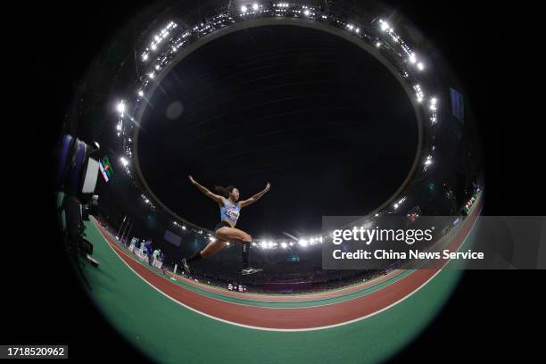 Vera Chan Shannon of Team Chinese Hong Kong competes in the Athletics - Women's Triple Jump Final on day 11 of the 19th Asian Games at Hangzhou...