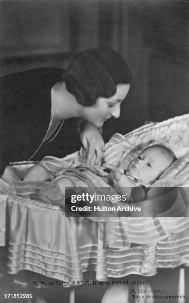 Princess Astrid Of Belgium with her son, Prince Albert of Belgium, later King Albert II of Belgium, circa 1934.