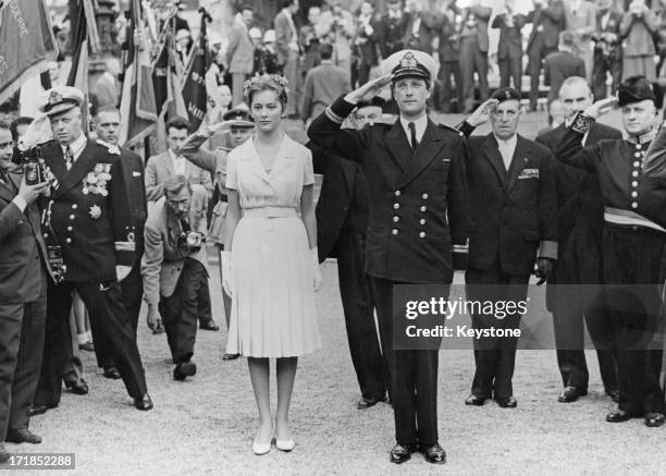 Prince Albert of Belgium, later King Albert II of Belgium and Princess Paola of Belgium announce their engagement to the people of Brussels from the...