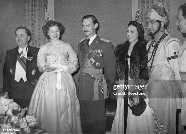 Princess Josephine-Charlotte of Belgium and Grand Duke Jean of Luxembourg attend a fete in Brussels, 21st January 1953.