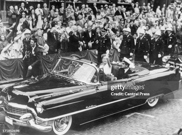 Prince Albert of Belgium, later King Albert II of Belgium and Princess Paola of Belgium meet fans gathered in La Grande Place whilst on a tour of...