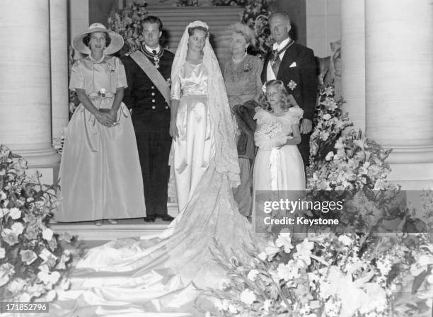 Prince Albert of Belgium, later King Albert II of Belgium and his bride Princess Paola pose with family members for a special picture after their...