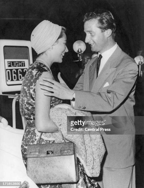 Prince Albert of Belgium, later King Albert II of Belgium greets his fiance Princess Paola of Belgium on her arrival at Brussels Airport, 6th June...