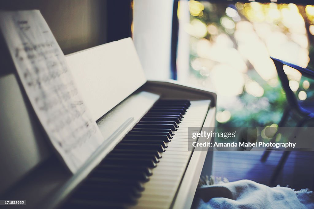 Piano with Balcony and Bokeh in the Background