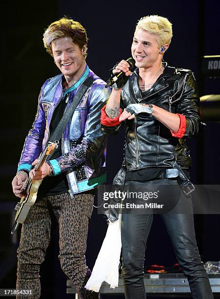 Guitarist Nash Overstreet and singer/guitarist Ryan Follese of Hot Chelle Rae perform as the band opens for Justin Bieber at the MGM Grand Garden...