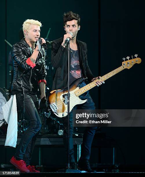 Singer/guitarist Ryan Follese and bassist Ian Keaggy of Hot Chelle Rae perform as the band opens for Justin Bieber at the MGM Grand Garden Arena on...
