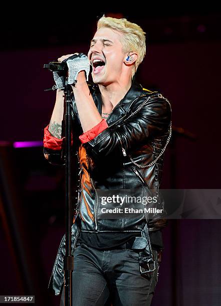 Singer/guitarist Ryan Follese of Hot Chelle Rae performs as the band opens for Justin Bieber at the MGM Grand Garden Arena on June 28, 2013 in Las...