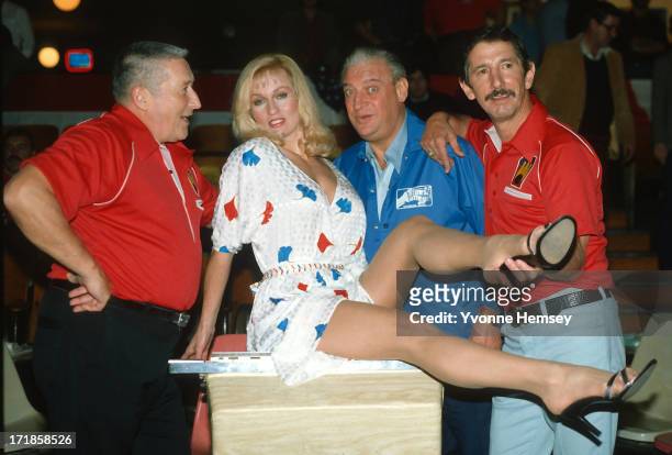 Writer Mickey Spillane, actress Lee Meredith, comedian Rodney Dangerfield, and New York Yankees manager Billy Martin tape a Miller Lite commercial...