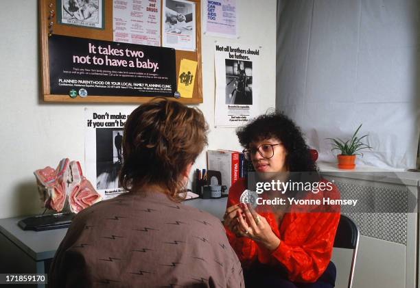 Planned Parenthood counselor advices a young woman about contraceptives February 3, 1988 In New York City.