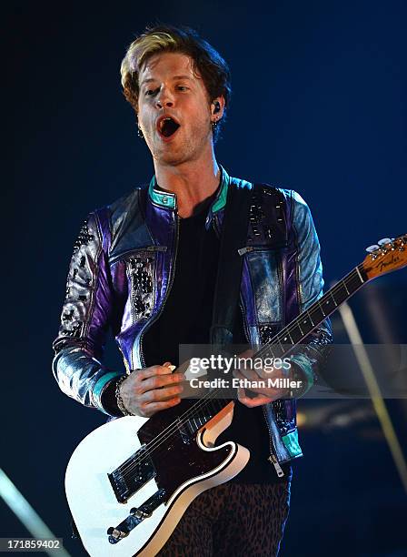 Guitarist Nash Overstreet of Hot Chelle Rae performs as the band opens for Justin Bieber at the MGM Grand Garden Arena on June 28, 2013 in Las Vegas,...