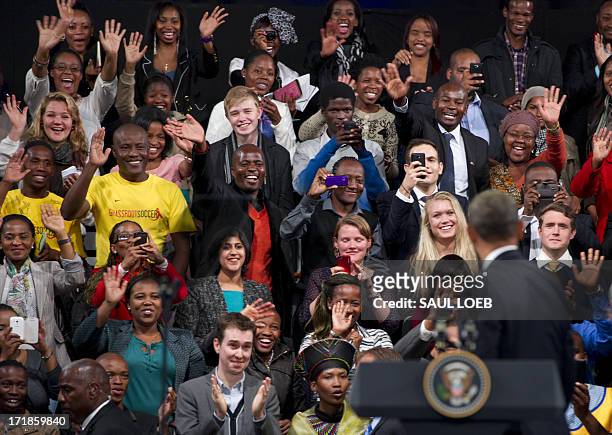 President Barack Obama arrives for a town hall meeting with young African leaders at the University of Johannesburg Soweto in Johannesburg, South...