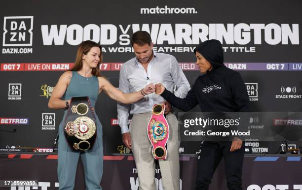 Terri Harper of Great Britain, promoter Eddie Hearn and Cecilia Braekhus of Norway pose for a photo during a press conference ahead of the Leigh Wood...