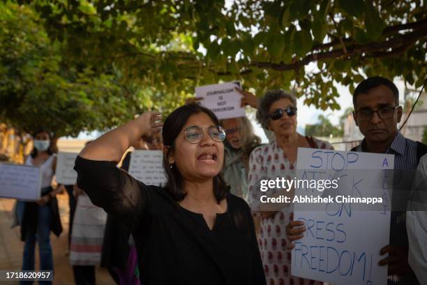 Woman shouts slogans during a protest against the arrest of NewsClick’s founder and editor-in-chief Prabir Purkayastha and Amit Chakravarty, the...